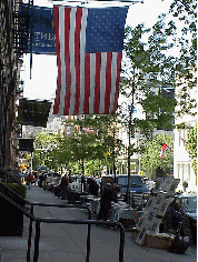 Top right photo you see West Broadway in Soho.  American flags are seen all over NYC as they are everywhere in the USA.