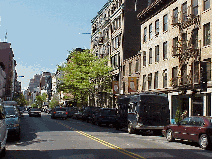 Bottom right picture you see a distant shot of West Broadway in Soho.  This influential neighborhood has some of the most famous restaurants in NYC.  The beautiful people love Soho too.  This is where famous models and actors enjoy shopping and dining.