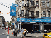 Center right picture you see Umbertos Clam House on Mulberry Street in Little Italy.  The restaurants and food in NYC is the best in the world.