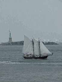 Top right picture you see a beautiful sailboat as it passes the Statue of Liberty.  A cruise around the island of Manhattan would be an outstanding way to spend the day with Dad.