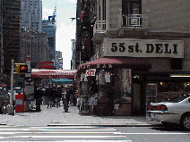 They say the way to a man's heart is through his stomach. Top right picture you see Sixth Avenue at 55th Street.  In the distance you see the Carnegie Deli.  This famous deli makes huge sandwiches, big enough for any man.