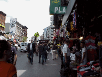 Center right photo you see people shopping on the sidewalk of Canal Street.  Like we said before, there isn't one place to purchase discount items... there are hundreds!