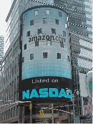 Top right picture you see the Nasdaq sign on Broadway in Times Square.  In this photo you see Amazon.com displayed.  One second later the picture will change from Amazon.com to another business.