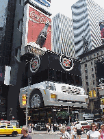 Bigger is better especially on Broadway.  Top right photo you see an advertisement for a Cadillac under the Coke sign on Broadway.