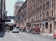 Bottom right picture you see a typical old street lined with warehouses.