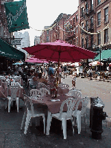 You'll want to come early and get a nice seat outside.  Half the fun is watching people as you dine on great Italian food. Top right photo you see a pretty table on Mulberry Street.