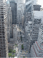 Top right picture you see Park Avenue as seen from a rooftop on 53rd Street.  In the distant center you see the Helmsley Building.