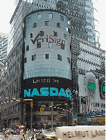 Center right picture you see the Nasdaq sign in Times Square on Broadway advertising VeriSign.  The advertisements change every couple of seconds.  It's a real eye catcher.