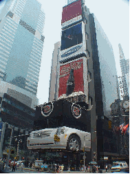 Top right picture you see Broadway in the center of Times Square.  A car that's bigger than life will get attention every time.