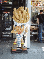 Hungry?  These fries will make you really hungry. Top right picture you see giant French Fries on the sidewalk in the East Village.