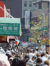 How busy the sidewalks are in Chinatown