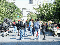 Extras standing around during another break during the shooting