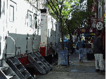 Movie production trucks lined up on West 4th Street