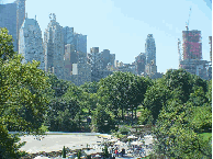 Central Park, the skyline of NYC and the Wollman Memorial Rink