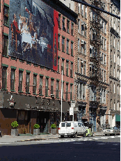 Win Restaurant Supply Store with a large billboard advertisement