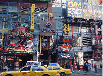 42nd Street, the Times Square Hilton Hotel, and Applebees