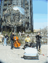 Jazz musicians playing in front of Trump International Hotel and Tower