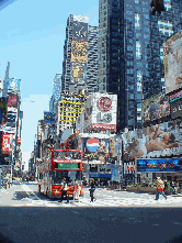 A tour bus making it's way down Broadway in Times Square