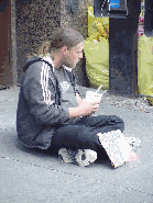 A homeless person on Canal Street