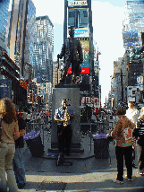 A saxophone player in Times Square