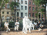 Christopher Park and sculptures by George Segal that depict two gay couples.