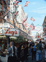 Lucy's and the American flags over Mulberry Street