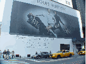 Louis Vuitton billboard on the corner of 57th Street and Fifth Avenue