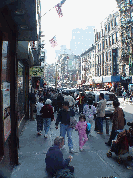 A beggar on a street in Chinatown