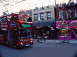 New York City Sightseeing tour buses on Bleecker Street