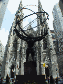 Atlas and behind him on Fifth Avenue you see St. Patrick's Cathedral