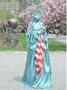 Statue of Liberty mime at Hope Garden in Battery Park