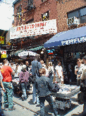 Canal Street near a Chinese Backrub Store