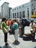 Chinese lady selling handbags on the corner of Canal Street