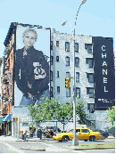 A billboard advertising Chanel