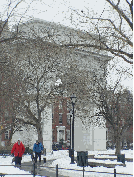 Washington Square Park as Villagers walk their dogs on a snowy day