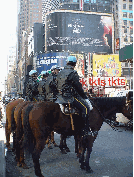 .  Seventh picture you see the policemen and their horses as they watch the traffic on Broadway.