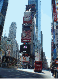 Second photo you see a New York Sightseeing Tour Bus making it's way through Times Square