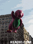 Barney Waving at Parade Photo 75th Annual Macy's Thanksgiving Day Parade Pictures on 34th Street New York, NY. Images of NYC Parade Floats and Balloons.